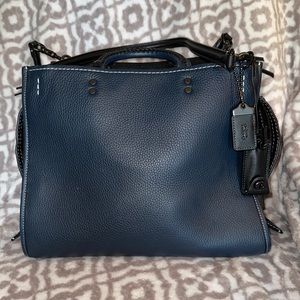 Authentic Coach Rogue with Western Whiplash Detail